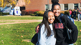 Students smiling happily.